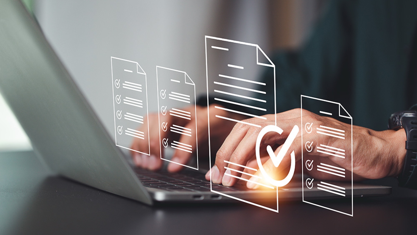 Hands typing on a keyboard